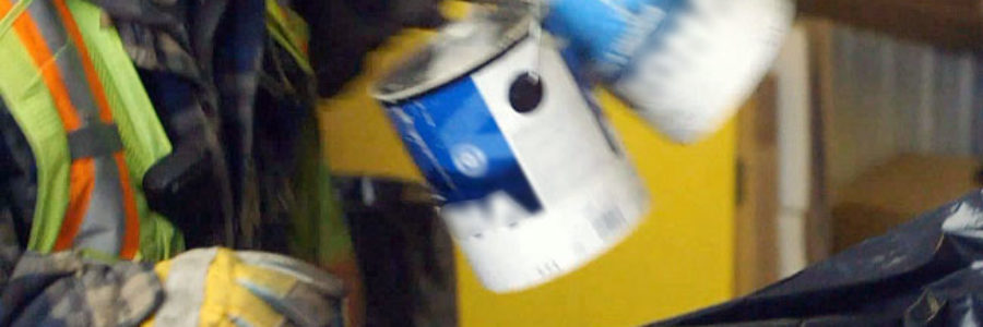 staff properly disposing of paint cans